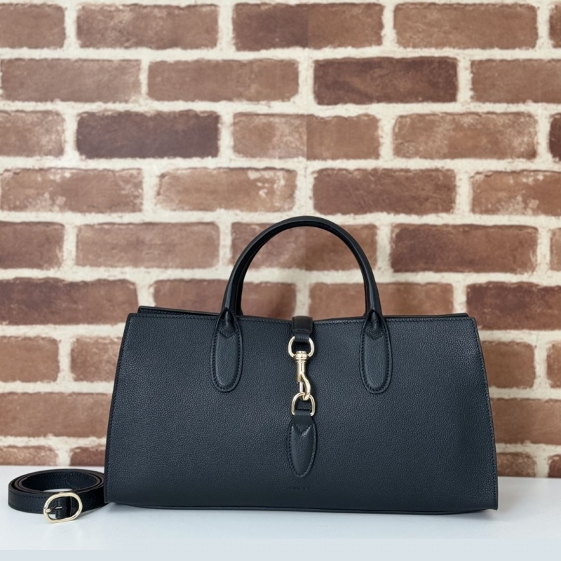 G*u*i top handle bags